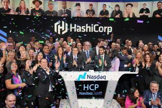 Hashicorp team clapping with confetti at Nasdaq bell ringing ceremony